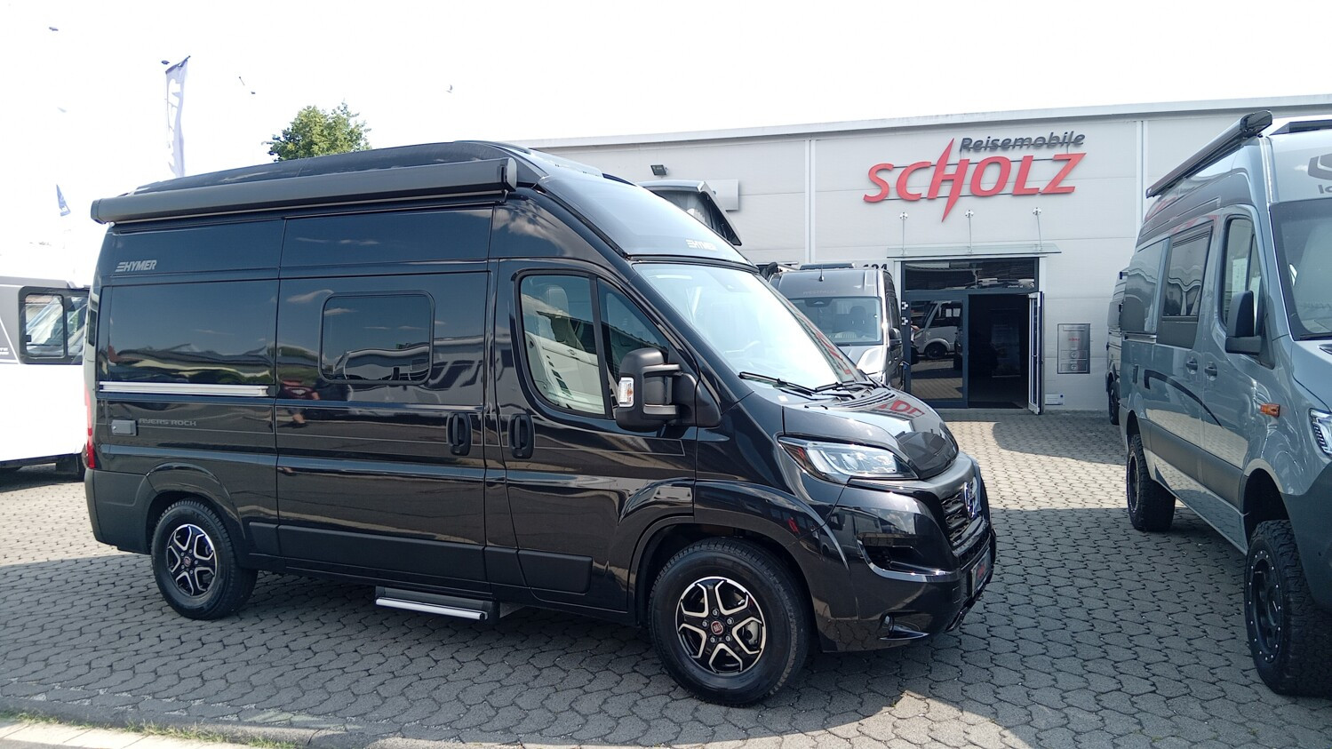 Hymer Van Ayers Rock 180PS Aut.*Leder*LED*Aufstelldach